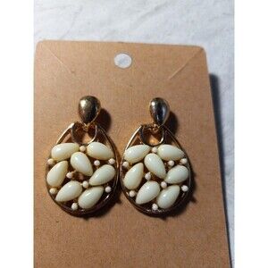 Paris Li pierced white and gold 1 in dangled earrings.